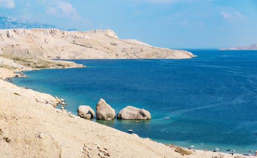 View of Beritnica beach on Pag island in Croatia. Popular tourist destination with amazing rock formations and beautiful coastline.