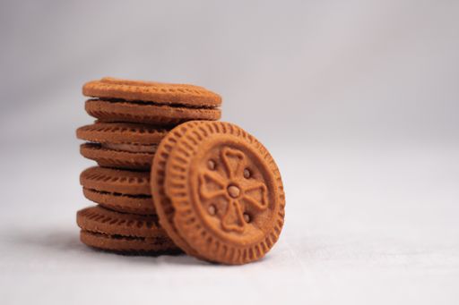 pile of brown cream biscuits food