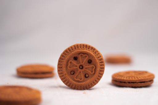brown cream cookies on white background food