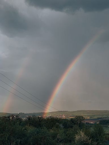 A beautiful view of the double rainbow after raining