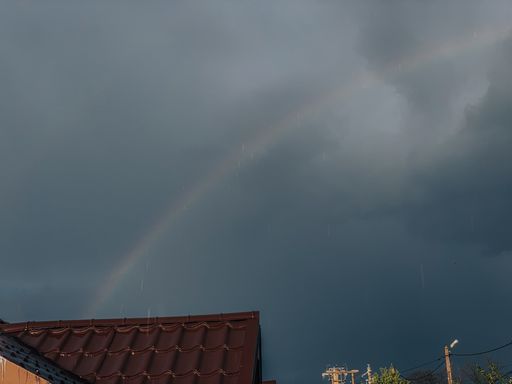 A mesmerizing view of a beautiful rainbow after raining