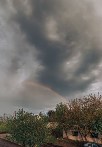 A mesmerizing view of a beautiful rainbow after raining