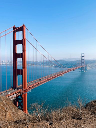 This stock photo features a breathtaking view of the iconic Golden Gate Bridge in San Francisco