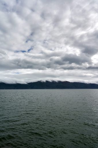 A vertical shot of Lake Sevan under a stormy sky in Gegharkunik, Armenia