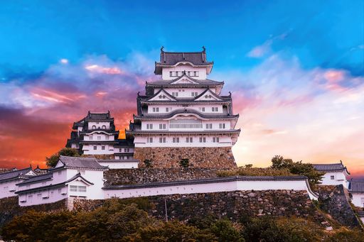A scenic view of Himeji castle in Hyogo Prefecture, Japan at sunset