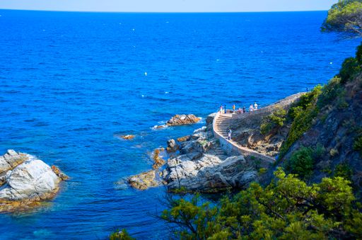 A high angle shot of a viewing deck at the coast of Lloret de Mar in Catalonia, Spain on a sunny day
