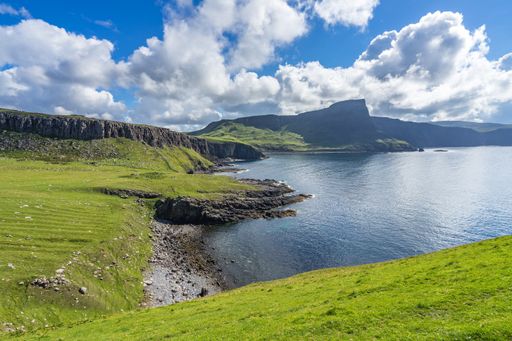 A sunny seascape with a coastline of Isle of Skye near Neist Point, Scotland