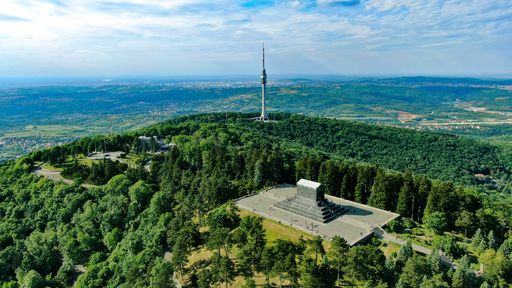 The aerial shot of Monument to the Unknown Hero and TV Tower on Avala mountain, Serbia