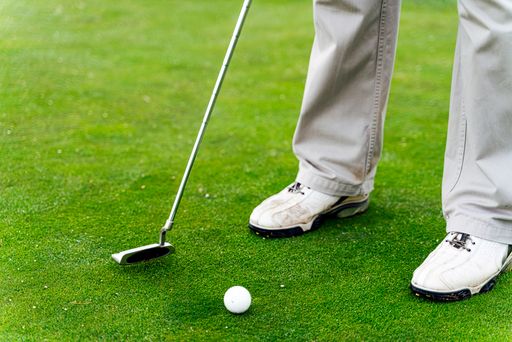 A golf ball in a golfing field during daytime