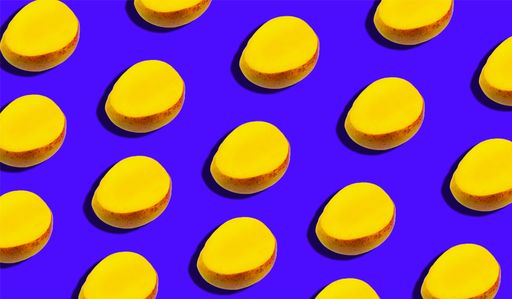 Mango fruit pattern on blue background, wallpaper.