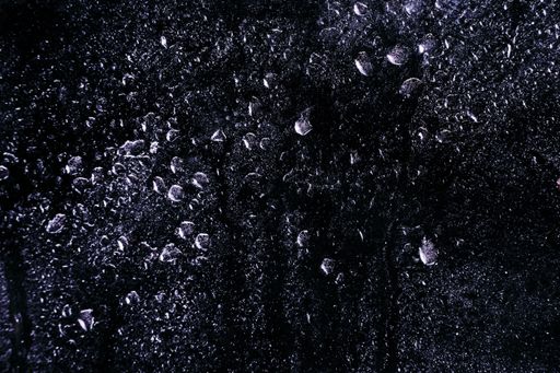 Water drops on a cristal surface, perfect to use for compositing.
