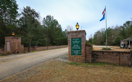 Fontainebleau State Park, Louisiana - February 2018: A sign set in brick marks the entrance to Fontainebleau State Park.