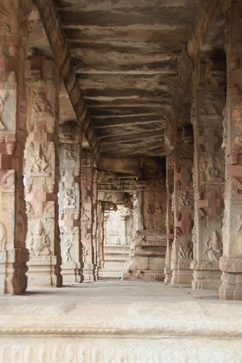 A corridor of stone pillars at Krishna Temple in Hampi, Karnataka, India, Asia