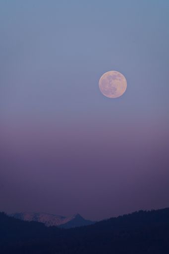Rising Supermoon above Bavarian Alps