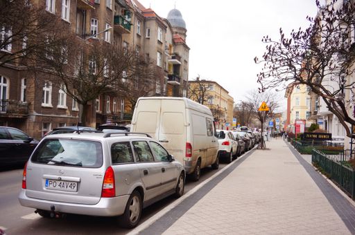 Parked Opel Astra by a sidewalk on the Slowackiego street.