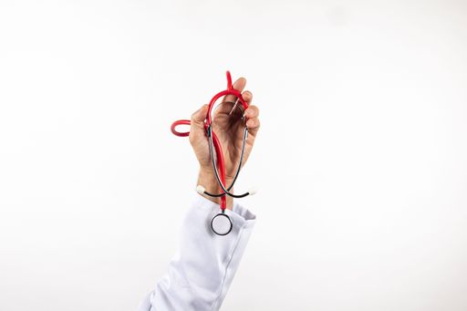 The Male hand holding a stethoscope.
