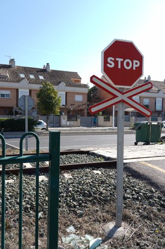 A stop warning sign on the rails in the station