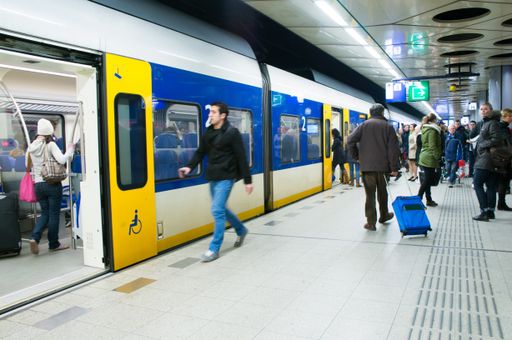 People entering the train. The train is used very often in these days.