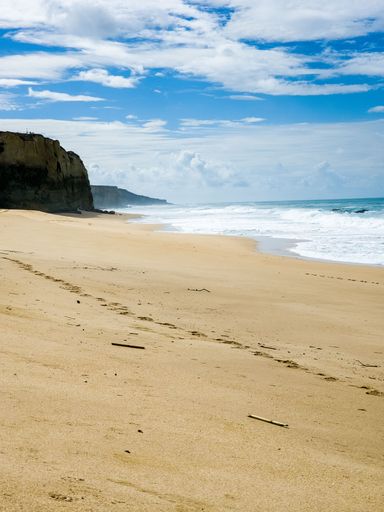 An idyllic beach in Lagoa de Albufeira, Sesimbra, Lisbon, Portugal, with a view of the Atlantic Ocean