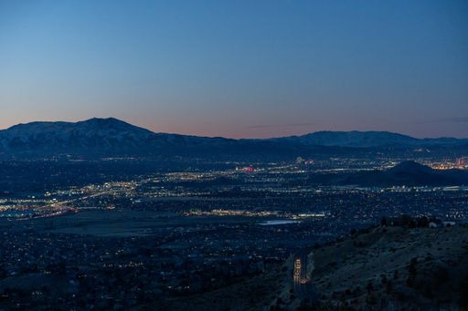 A beautiful sunrise over the illuminated Phoenix city in Arizona