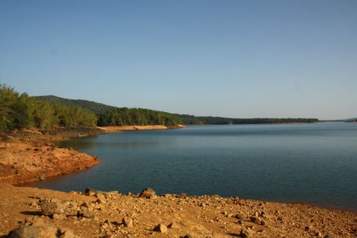 The beautiful sunny reservoir bank of Sharavathi river in Karnataka, India