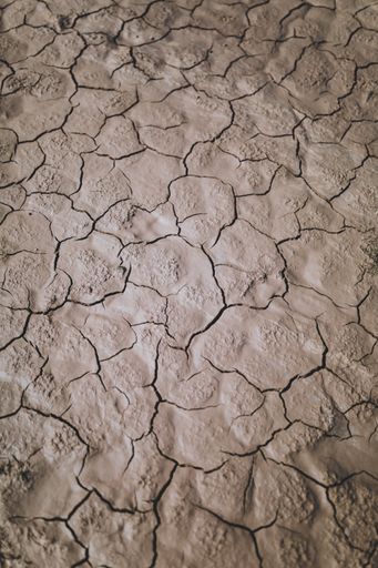 A vertical overhead shot of clay in beautiful patterns - perfect for mobile