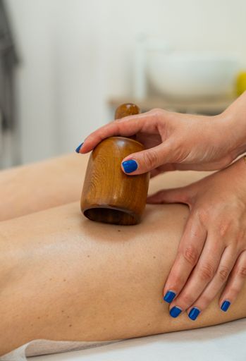 A Swedish wooden cup for radiotherapy massage treatment
