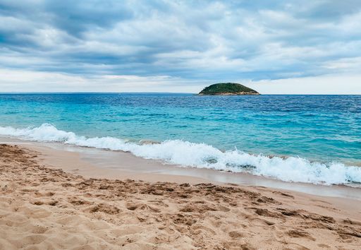 The beautiful view of a sandy beach and turquoise waters. Mallorca, Spain