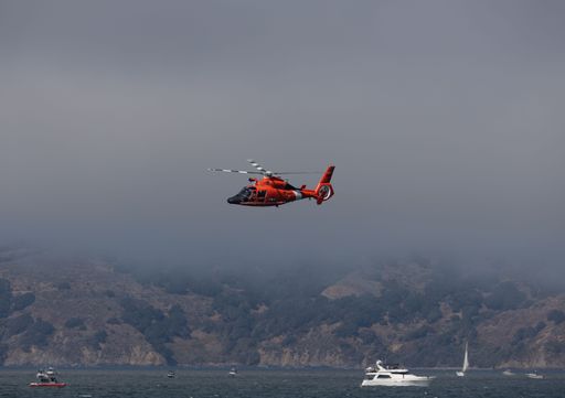 A United States Coast Guard helicopter flying during a demonstration on Fleet Week in San Francisco
