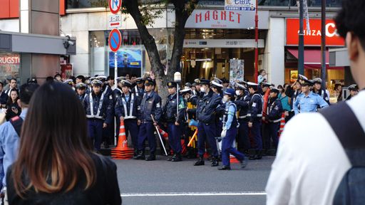 Shibuya, Tokyo, Japan - October 28 2023 district during Halloween, a significant police presence ensures public safety, reflecting the city's commitme