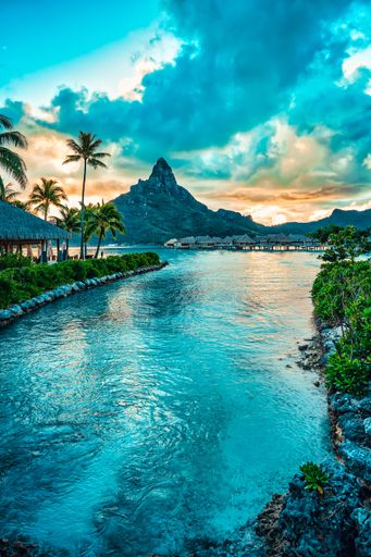 A picturesque sunset over the ocean and mountains. Bora Bora, French Polynesia
