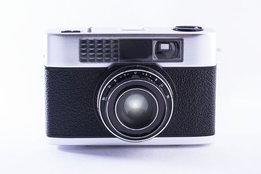 A closeup shot of a camera on white background