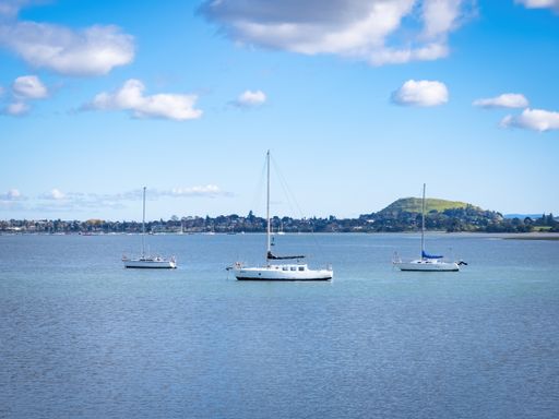View of boats moored in Tamaki River. Auckland, New Zealand - May 13, 2021