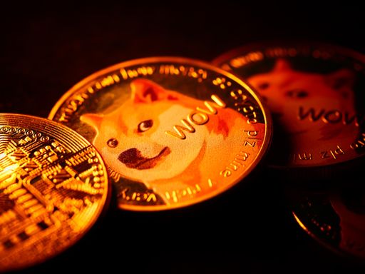 A selective focus shot of a coin with a Shiba Inu dog meme named "Doge" and a "Wow" engraving on it