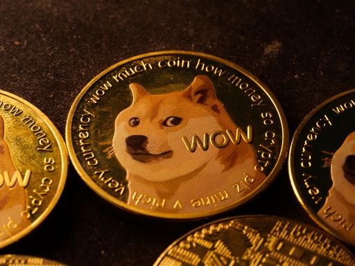 A selective focus shot of a coin with a Shiba Inu dog meme named "Doge" and a "Wow" engraving on it