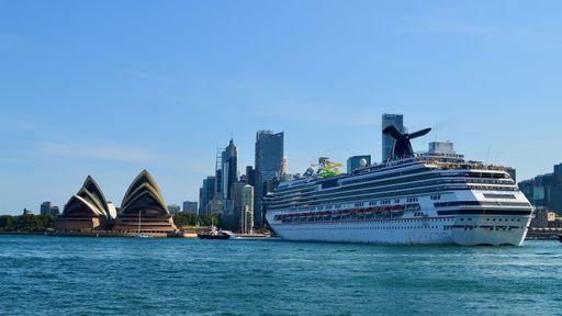 The cruise ship Carnival Splendor passes the Sydney Opera House as it exits the harbor