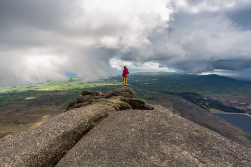A caucasian woman hiking in the beautiful Slieve Binnian Mountains, North Ireland