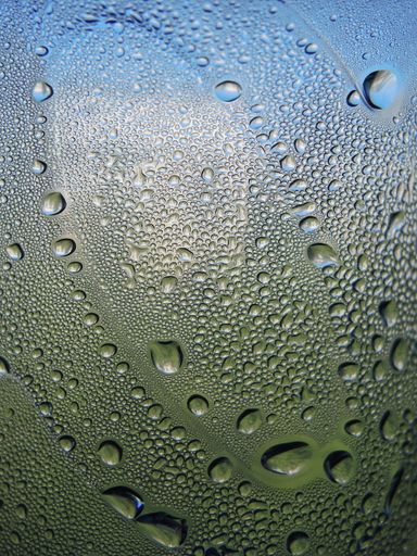 A closeup shot of bubbles in a water bottle