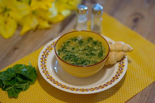 A selective focus shot of a bowl of spinach soup