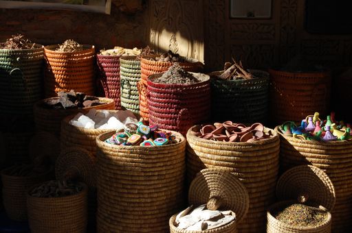 A close-range shot of spices bowls in different baskets