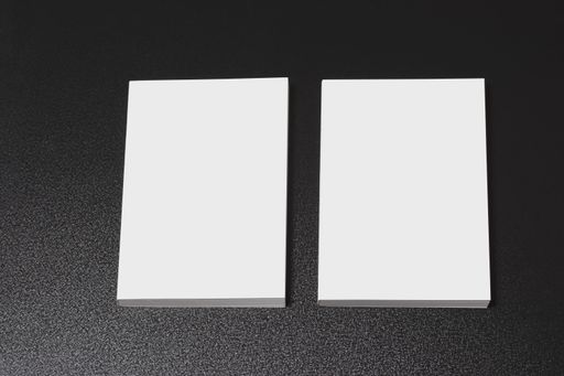 Two books with blank cover on the dark glossy table, editable mock-up series ready for design, selection path included
