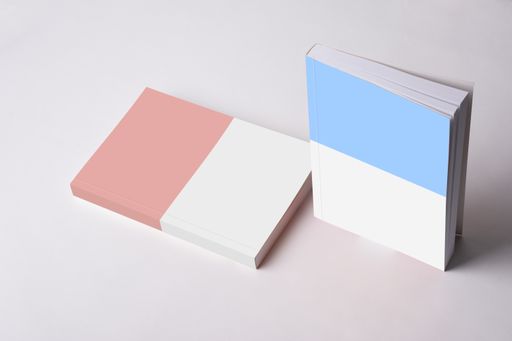 Two softcover books next to each other, mock-up template ready for design, books cover selection path included