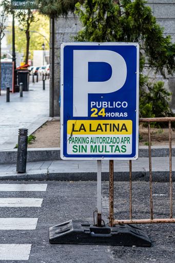 Madrid, Spain. April 6, 2021.Vertical shot of an authorized parking sign in central Madrid, in La Latina. Authorized Parking APR without fines.