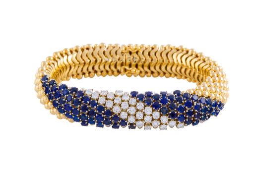 A female gold bracelet with diamonds and sapphire isolated on a white background