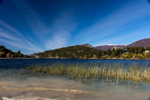 The mountains around a lake in Nahuel Huapi National Park in Bariloche, Argentina