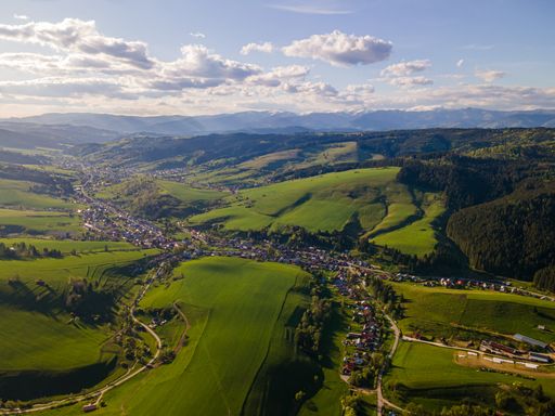 Location is Cierny Balog. This small village is in Slovakia. Mountains in the background are called Low Tatras. The photo was shot on DJI Mavic Air 2.