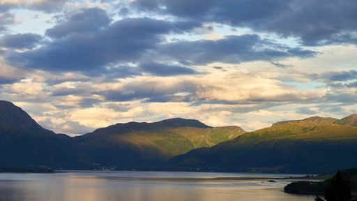 A view of dramatic clouds and mountains close to Kristiansund in Norway