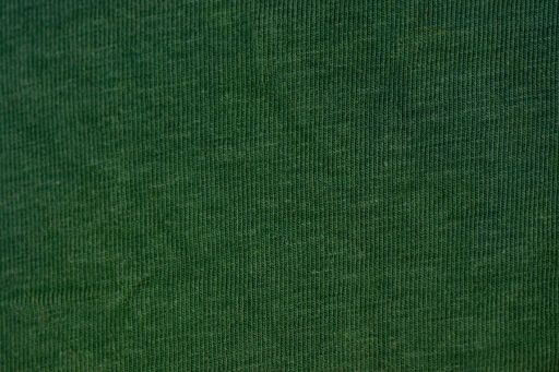 A closeup of green fabric texture