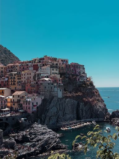 A scenic shot of Manarola, a small fishing village located in the Cinque Terre region of Italy.