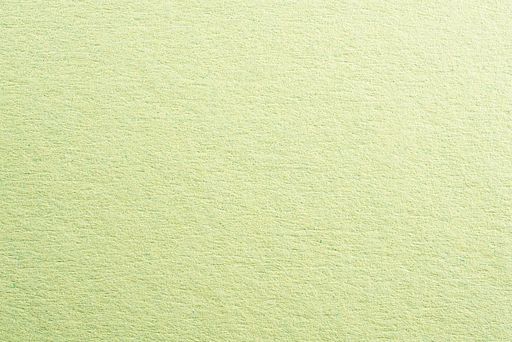 A closeup shot of a green wall texture